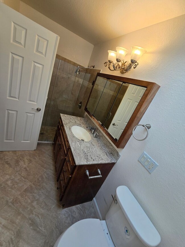 Building Photo - Tri Level Townhouse located in a Gated Com...