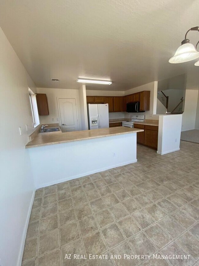 Building Photo - 4850 N 113th Dr