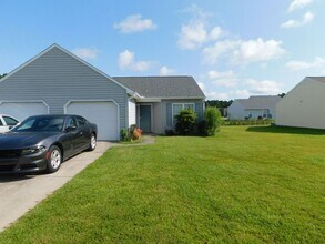 Building Photo - Charming 2-Bedroom, 2-Bath Duplex with Garage
