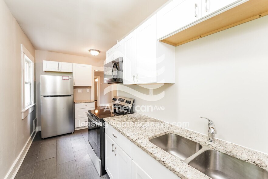 Building Photo - 7792 Rugby Ave