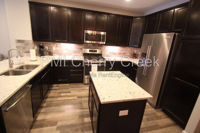 Building Photo - 9008 E Caley Way