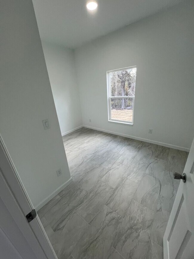 Building Photo - Brand-New 3BR/2BA Home with Garage – Serene Lake Placid Neighborhood