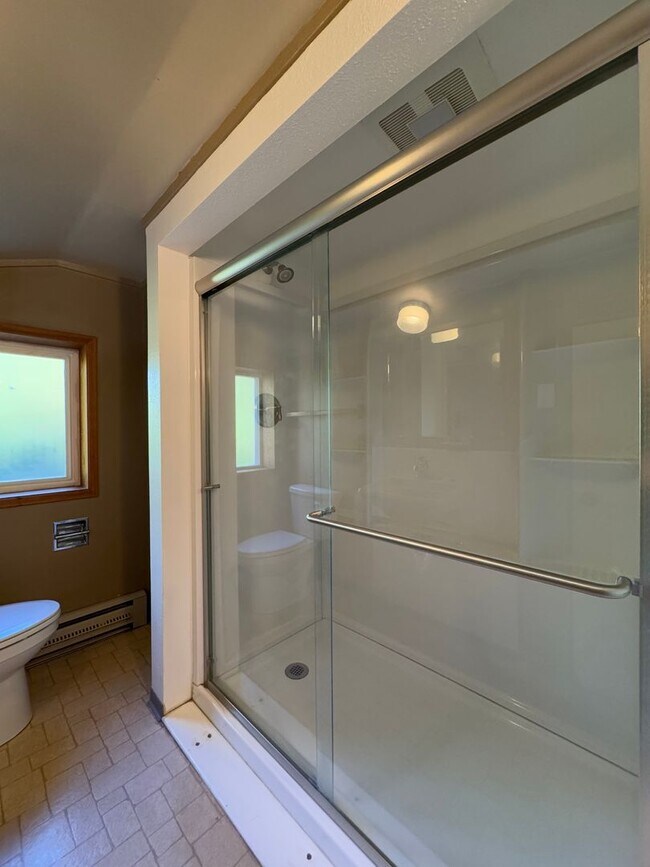 Building Photo - Expansive Updated Home with Creek Views & Prime Location