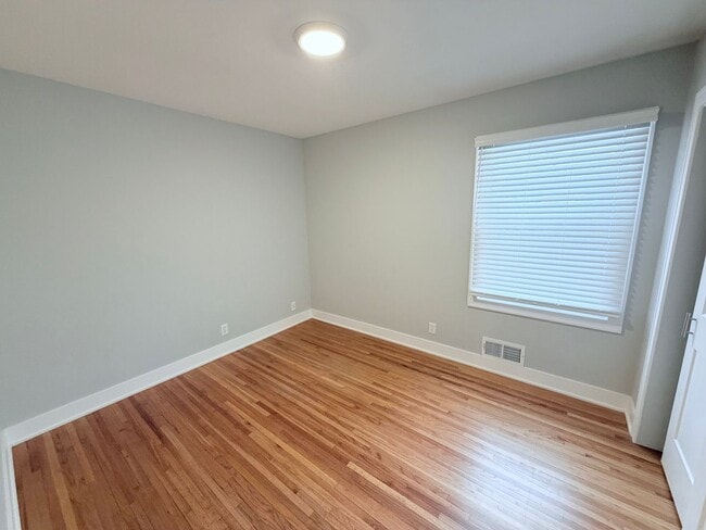 Building Photo - Spacious 4-Bedroom Home with Pond Views & EV-Ready Garage – Bloomington!!