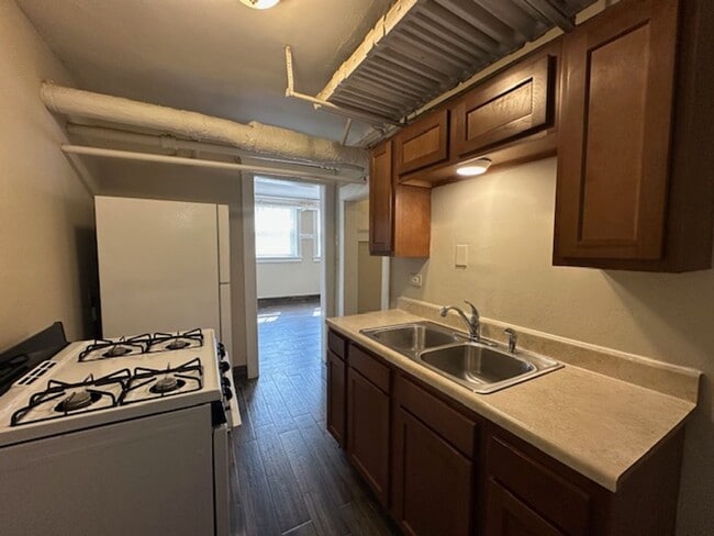 Building Photo - Freshly Renovated 2BR Garden Apartment Near UWM $1,350/mo – Heat Included