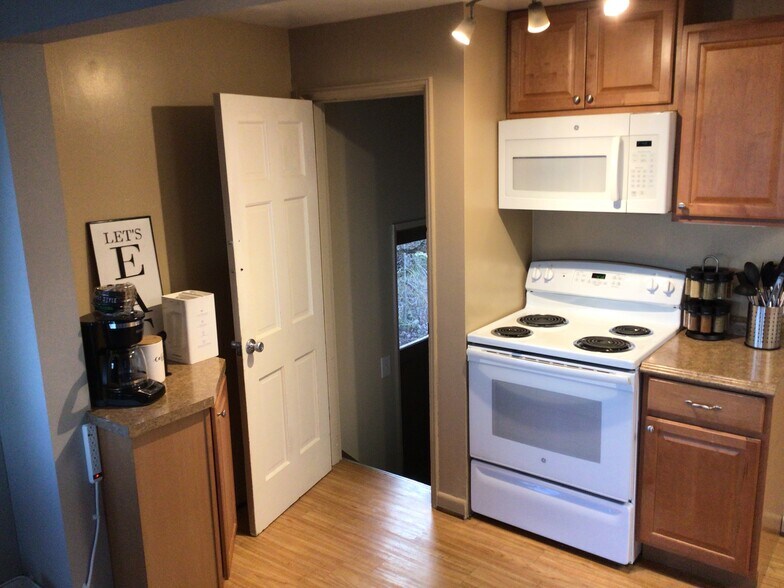 Upstairs kitchen looking at basement entry - 4008 37th Ave SW
