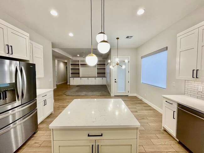 Building Photo - Lovely Four-Bedroom in Ivins with 3-Car Garage and Small RV parking Has Lots of Upgrades