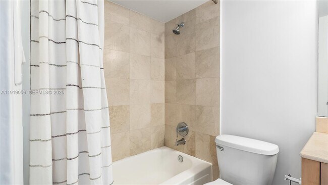 Building Photo - 10275 Collins Ave