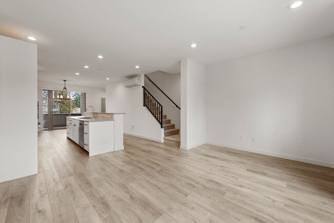 Building Photo - Modern 3 Bed 3.5 Bath Townhome with Garage, Balcony and Fenced Yard Near Light Rail