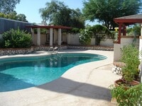 Building Photo - Available March 1, 2026. Updated 2 Bedroom 1.5 Bath Duplex with private dedicated pool.