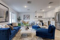 Building Photo - Modern New Construction 2 Bedroom Townhome with Garage & Driveway — First Occupancy!