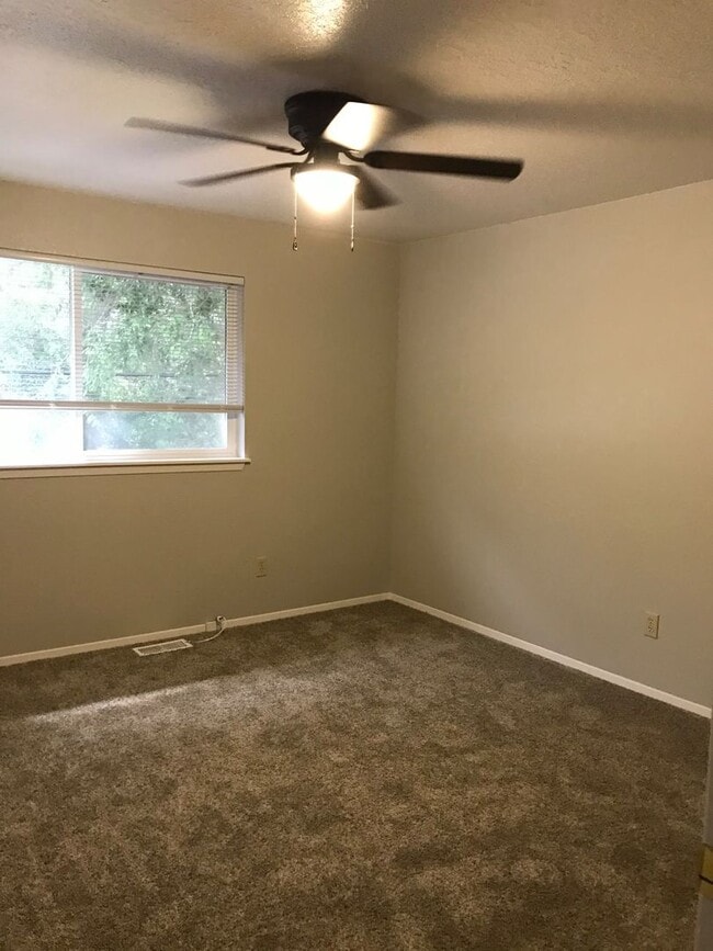 Building Photo - Updated 2 BR / 1.5 BA End Unit – Private Yard & Fresh Interior!