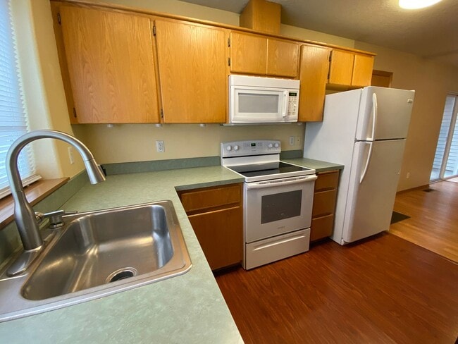 Building Photo - Great Duplex Unit with Attached Garage, Covered Patio, and Two Primary Suites