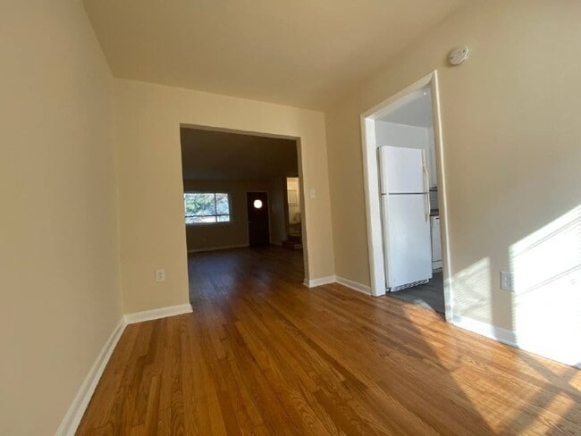 Building Photo - A spacious two bedroom, one and one half bath condo townhouse located in the northern section of ...
