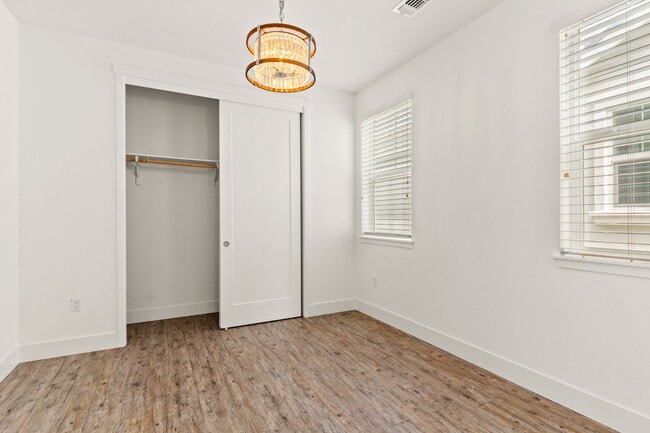 Building Photo - Sun-Filled Corner 4BR w/ Dual Yards & Panoramic Indoor-Outdoor Flow