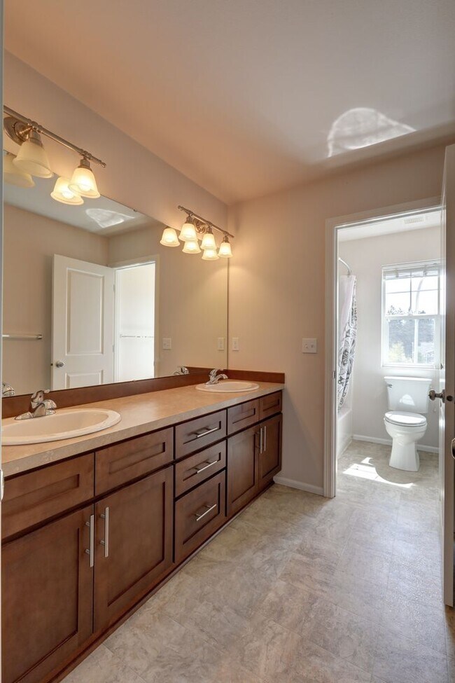 Building Photo - 4 Bedroom Home with Open Den, Living & Family Rooms – Space for Everyone