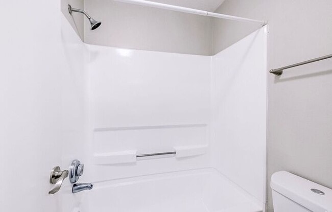 Building Photo - Spacious 2-Bedroom Elite Apartment with Private Balconies & Washer/Dryer