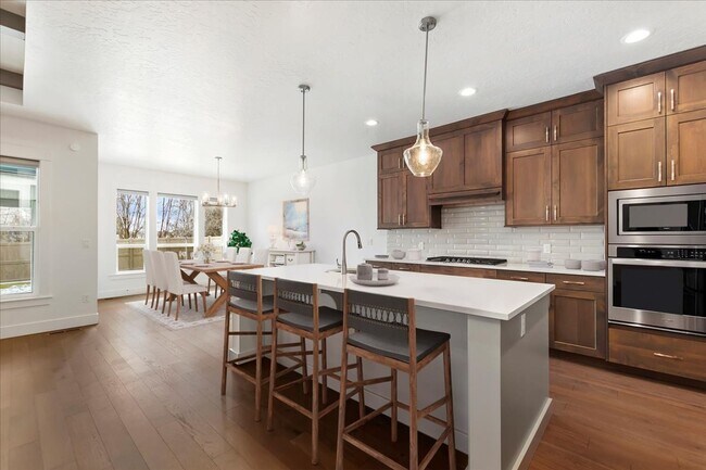 Building Photo - 4 Bedroom, 2 Bath home in Beautiful Meridian with SO MANY upgrades and perks throughout!  You don...