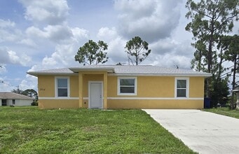 Building Photo - GREAT SW LEHIGH LOCATION-THREE BEDROOM -2 BATH-MOVE IN READY