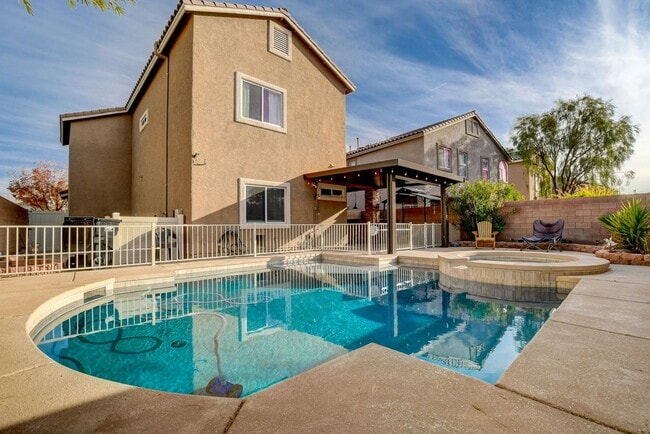Building Photo - Pool Home with Downstairs Primary Bedroom!