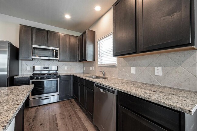 Building Photo - 5619 Brooklyn Rose Dr
