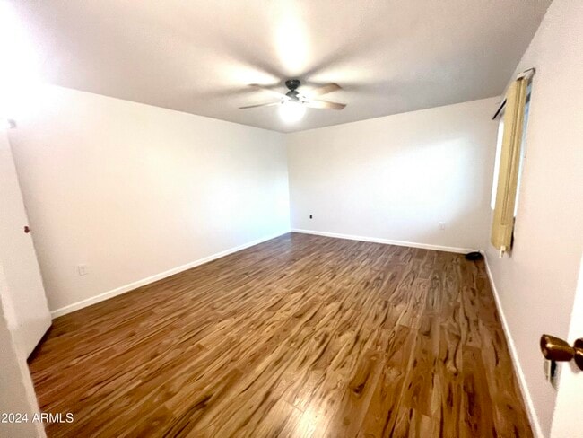 Building Photo - 9815 W Lancaster Dr