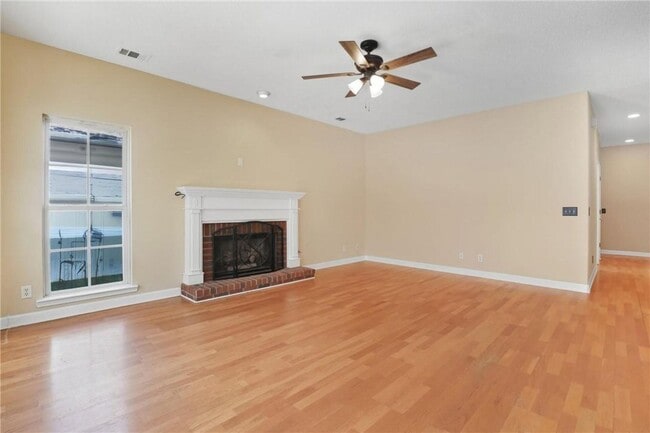 Building Photo - 4-Bedroom Home in Wild Heron with Front Porch and Fenced Yard