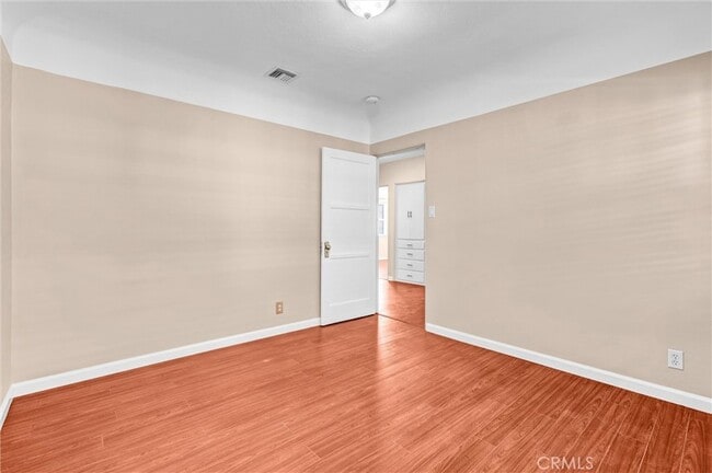 Building Photo - 9807 S Denker Ave