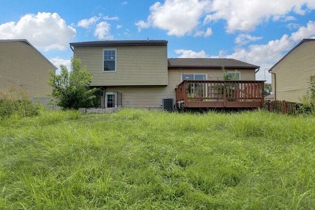 Building Photo - Spacious 4-Level Home with Deck, Workshop ...