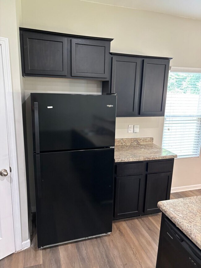 Building Photo - August Rent Free - Four Bedroom Fenced Yar...