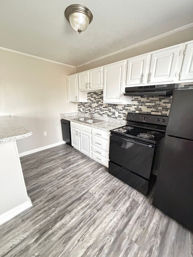 Building Photo - April Savings Are Here! Application Fee WAIVED ALL month!