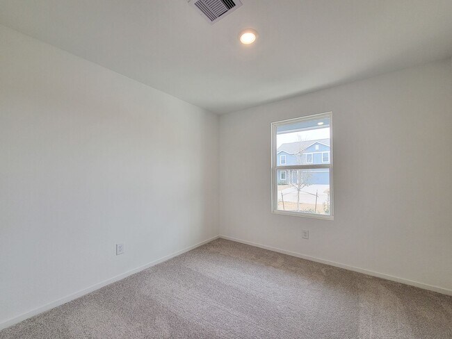 Building Photo - This great new single-story design makes smart use of the space available. At the front are all t...