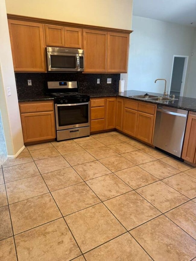 Building Photo - AVAILABLE NOW - $500 off first month rent - 4bd/2ba, 1895 Sq. Ft. Single Family Home with Solar