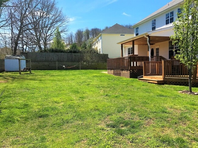 Building Photo - Great Family Home -  Fenced Backyard - Garage!