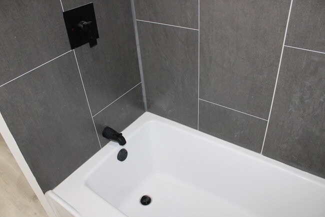 Building Photo - Move in Special - 4 Bedroom and 3 full bat...