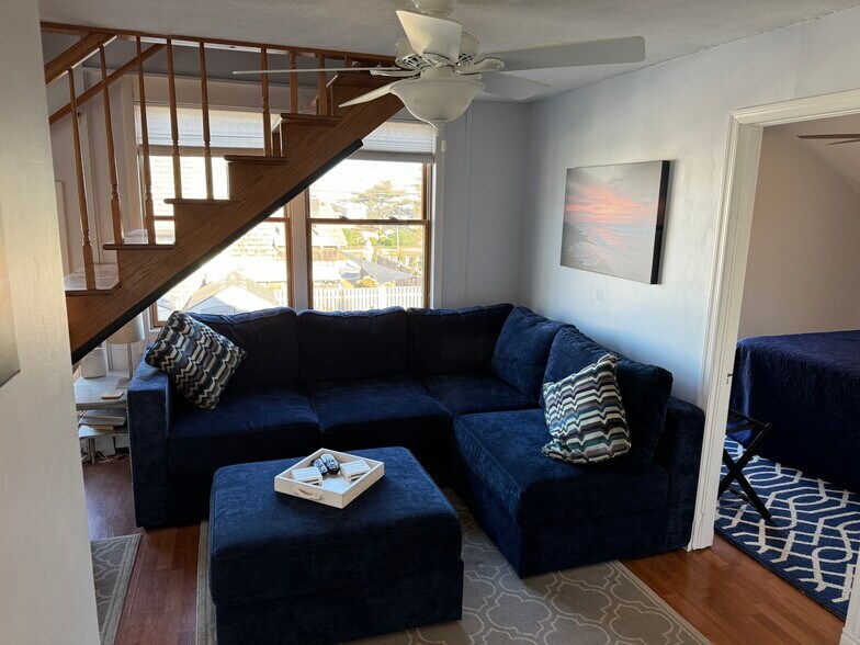 Living room with new sectional - 209 Amber St