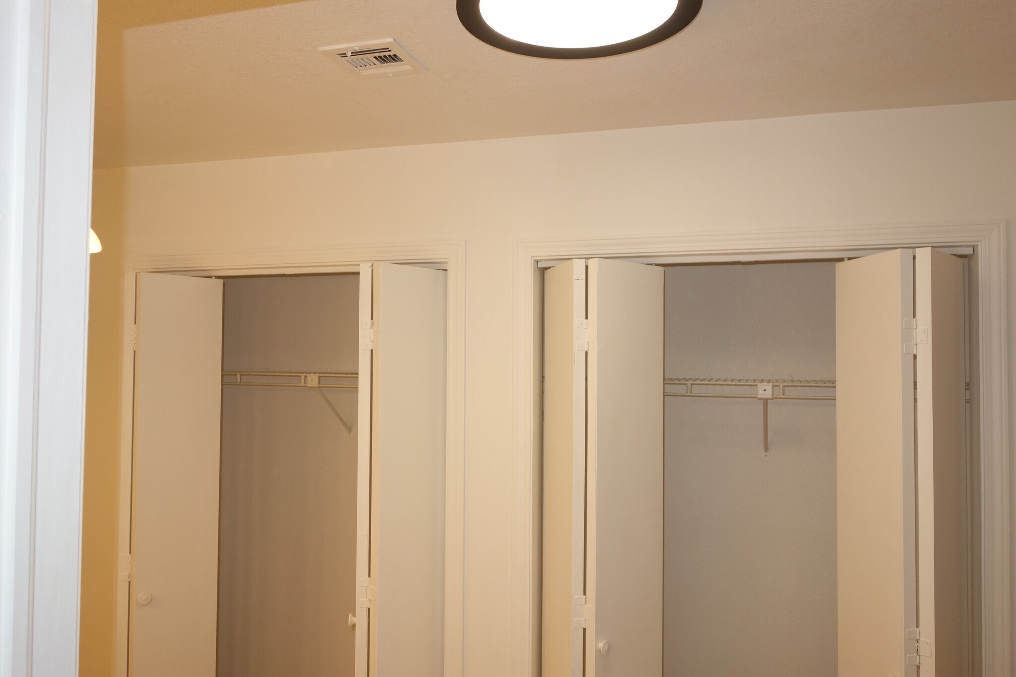 Double bi-fold door closets - 6656 S Utica Pl