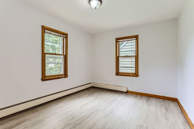 Building Photo - Lovely 4BR Home on a Quiet, Tree-Lined Street