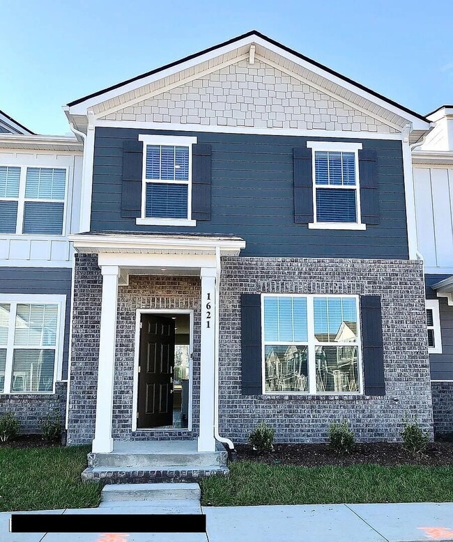 Primary Photo - "Charming 3-Bed Townhouse with Granite Acc...