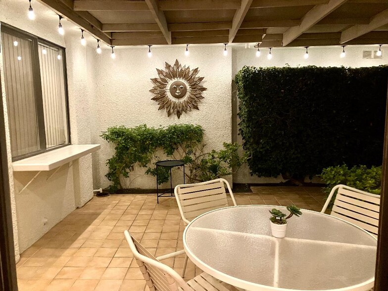 private patio at night - 14 Tortosa Dr