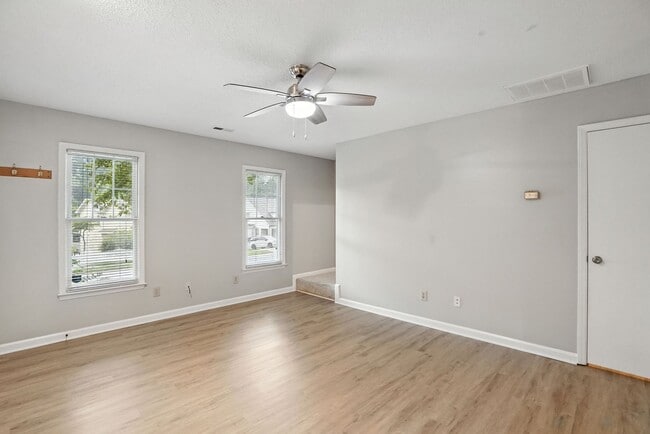 Building Photo - Spacious 2-Bedroom, 2.5-Bath End-Unit Town...