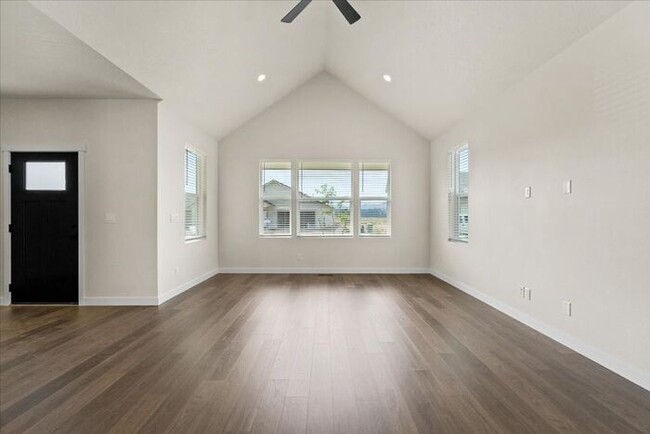 Building Photo - Brand New, Stylish 4-Bedroom Home with Vau...