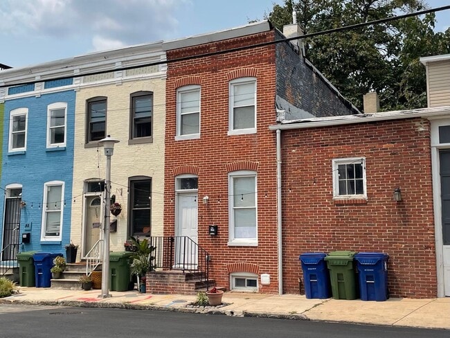 Building Photo - Charming 2-Bedroom, 1.5-Bathroom Brick Townhouse in Pigtown
