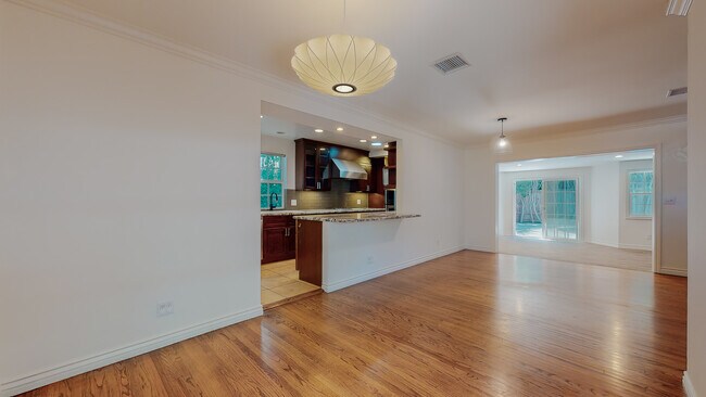 Living room, dining area, family room & kitchen counter... - 18406 Bessemer St