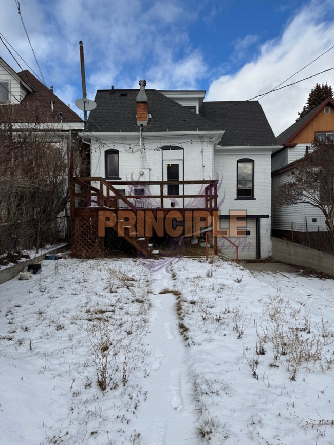 Building Photo - Charming Three-Bedroom Home with Garage and Yard