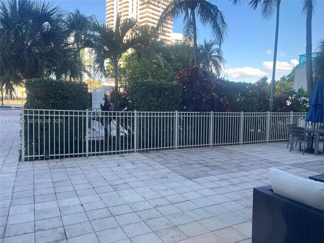 Building Photo - 19390 Collins Ave