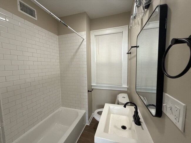 Building Photo - Freshly Renovated 5-Bedroom Home – Quality...