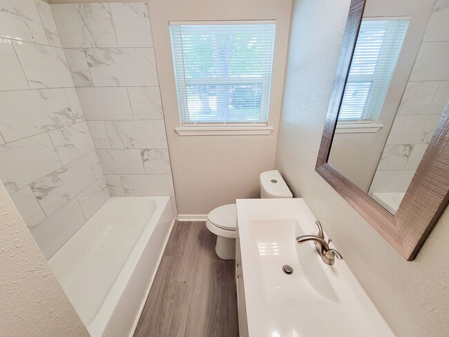 Building Photo - RECENTLY REMODELED 4 BEDROOM 2 BATH LEASE HOME WITH ALL THE UPGRADES.  CHECK THIS OUT.  WON'T LAS...