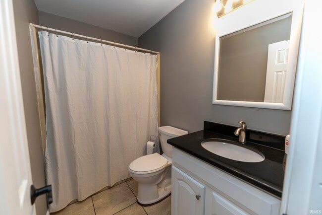 Building Photo - 7122 Woods Dr