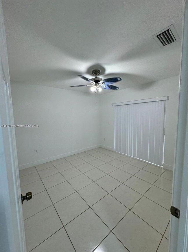 Building Photo - 27070 SW 134th Pl